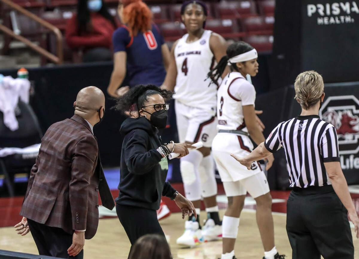 South Carolina Gamecocks head coach Dawn Staley and Assistant Coach Fred Chmiel object to a foul call on South Carolina Gamecocks forward Aliyah Boston (4) during the second half of action as the Gamecocks play Ole Miss at the Colonial Life Arena in Columbia, S.C.