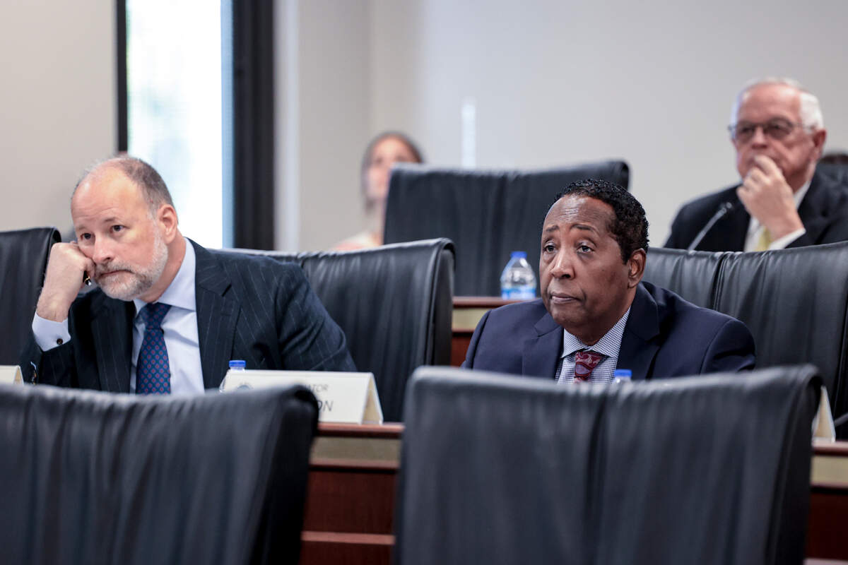 State Sen. Sean Bennett, R-Dorchester, left and state Sen. Darrell Jackson, D-Richland listen during a meeting of the Joint Bond Review Committee.