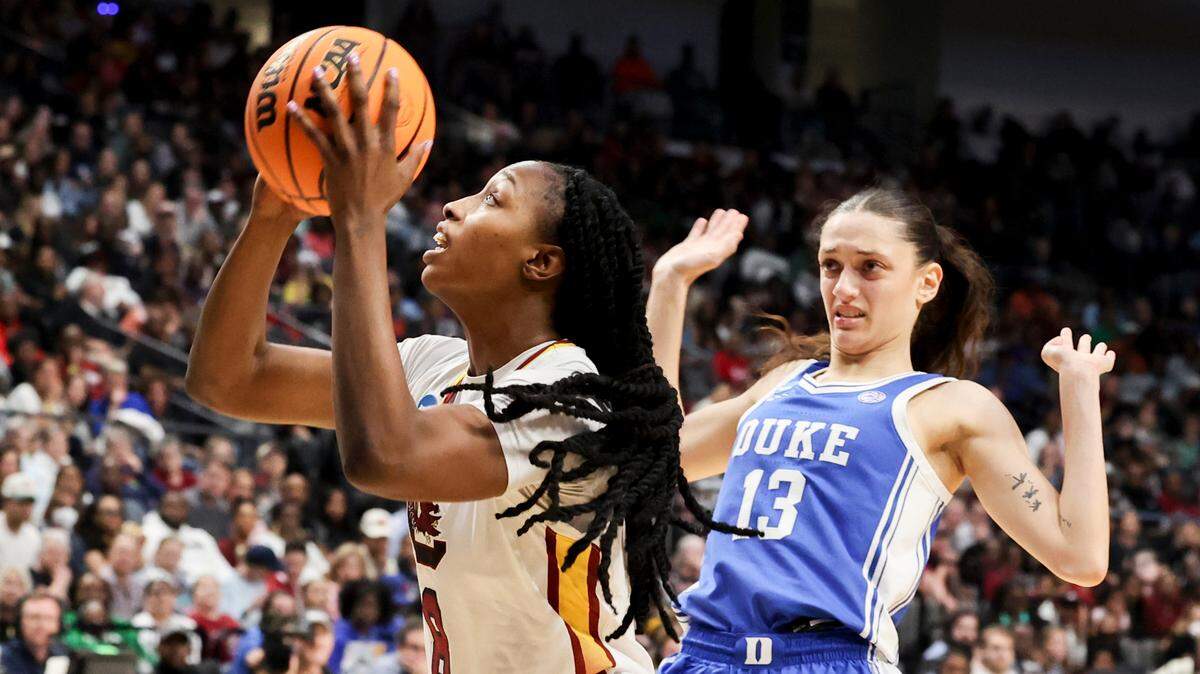 University of South Carolina’s Joyce Edwards (8) shoots as Duke’s Jordan Wood (13) pressures during the first half of action at the Legacy Arena in Birmingham on Sunday, March 30, 2025 in the Birmingham 2 regional of the NCAA Tournament.