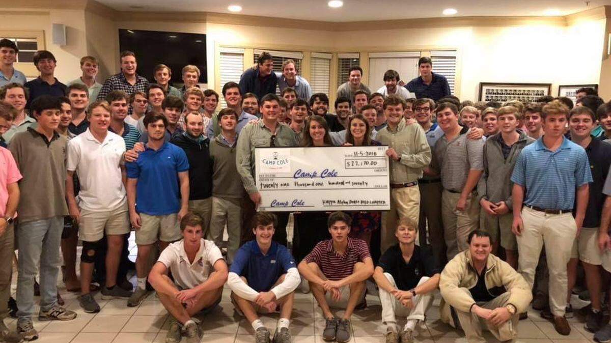 Members of the Kappa Alpha Order at the University of South Carolina pose for a picture after raising money for Camp Cole, a Midlands-based retreat for people who are physically and mentally ill.