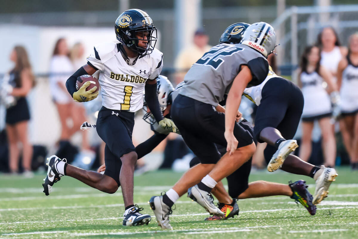 Camden Bulldogs Jo Jo Crim (1) returns the opening kickoff during their game at Gray Collegiate Academy in West Columbia, SC, Friday, September 8, 2023.