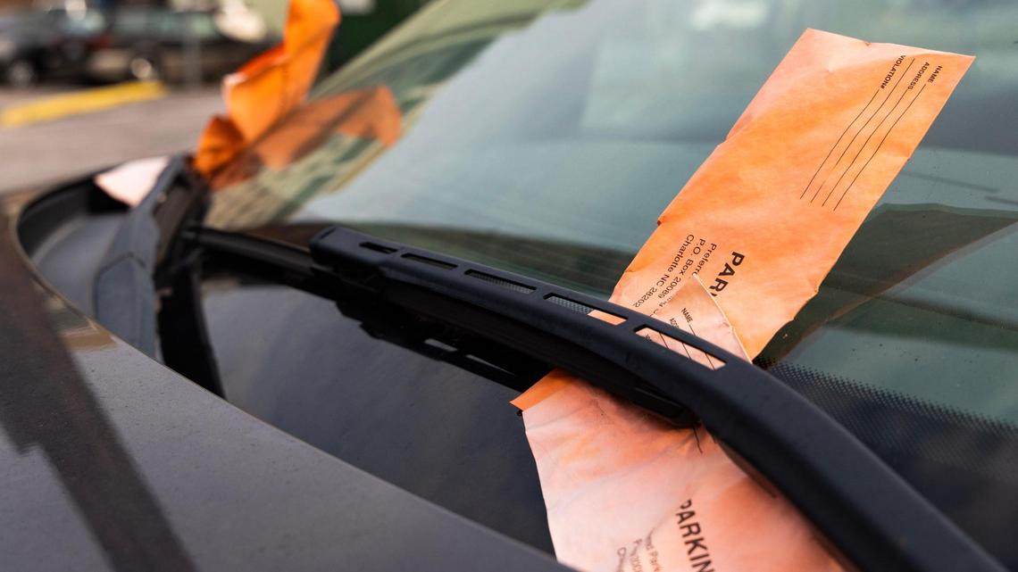 Parking tickets pile up on a parked car near the South Carolina Statehouse on Tuesday, May 23, 2023.