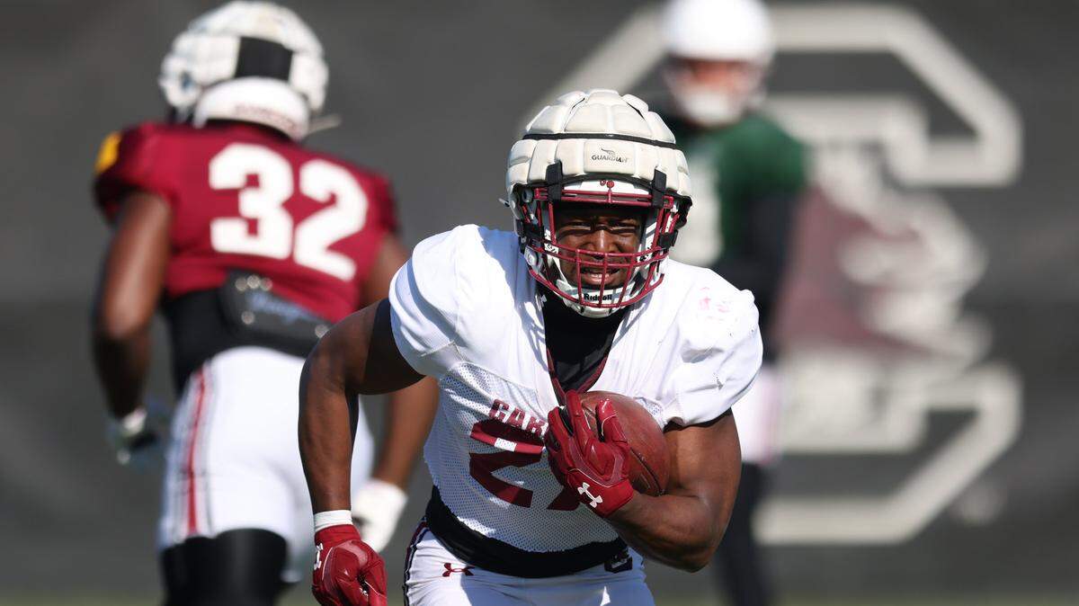 South Carolina running back Oscar Adaway III (27) runs drills during practice in Columbia on Thursday, March 27, 2025.