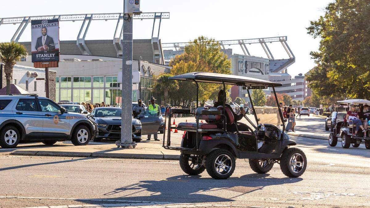 Golf carts buzz around Williams-Brice Stadium and surrounding parking lots before USC’s game against Missouri on Saturday, Nov. 16, 2024