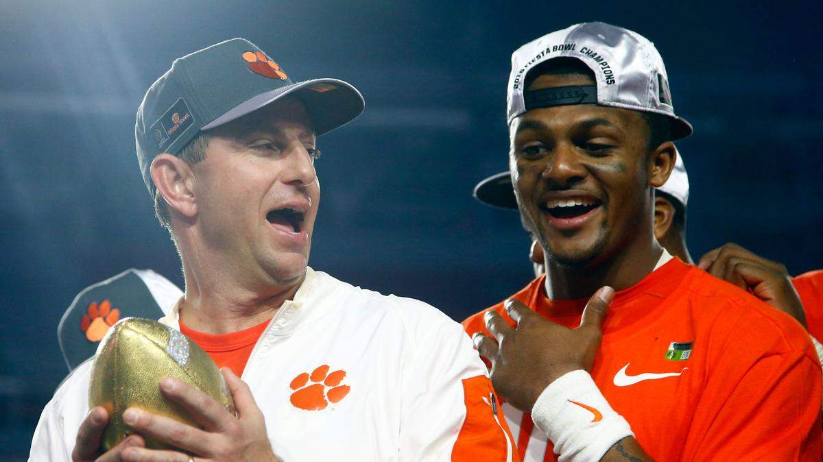 Dabo Swinney (left) and Deshaun Watson won a national title together at Clemson.