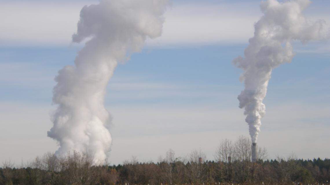Dominion Energy’s Wateree power station rises above the flat farmland of lower Richland County. The coal-fired plant is closing ash waste ponds that have polluted groundwater.
