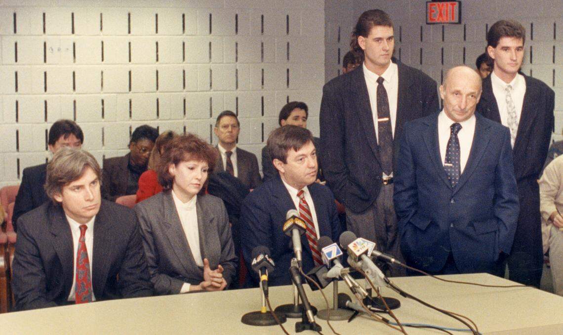 In this file photo from Dec. 14, 1989, Kay Smith appears at her parole hearing. At her left is her attorney from Maryland, John Hassett. To her right is Columbia lawyer, Dick Harpootlian. Her family -- sons James and Danny and husband Ray Smith -- are on the far right.
