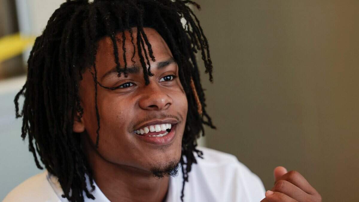 Daniel Hankins-Sanford speaks during media day on Wednesday.
