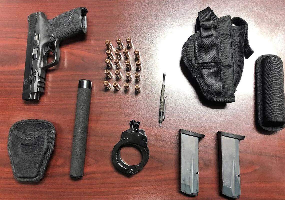 Deputies found Raymond Allen walking with a handgun, expandable police baton and handcuffs.