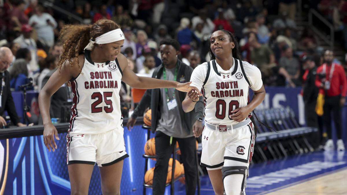South Carolina's Raven Johnson (25) and Ta'Niya Latson (00) walk off the court after beating LSU to advance to the SEC Championship game in the SEC Tournament, against LSU at the Bon Secours Wellness Arena on Saturday, March 7, 2026.