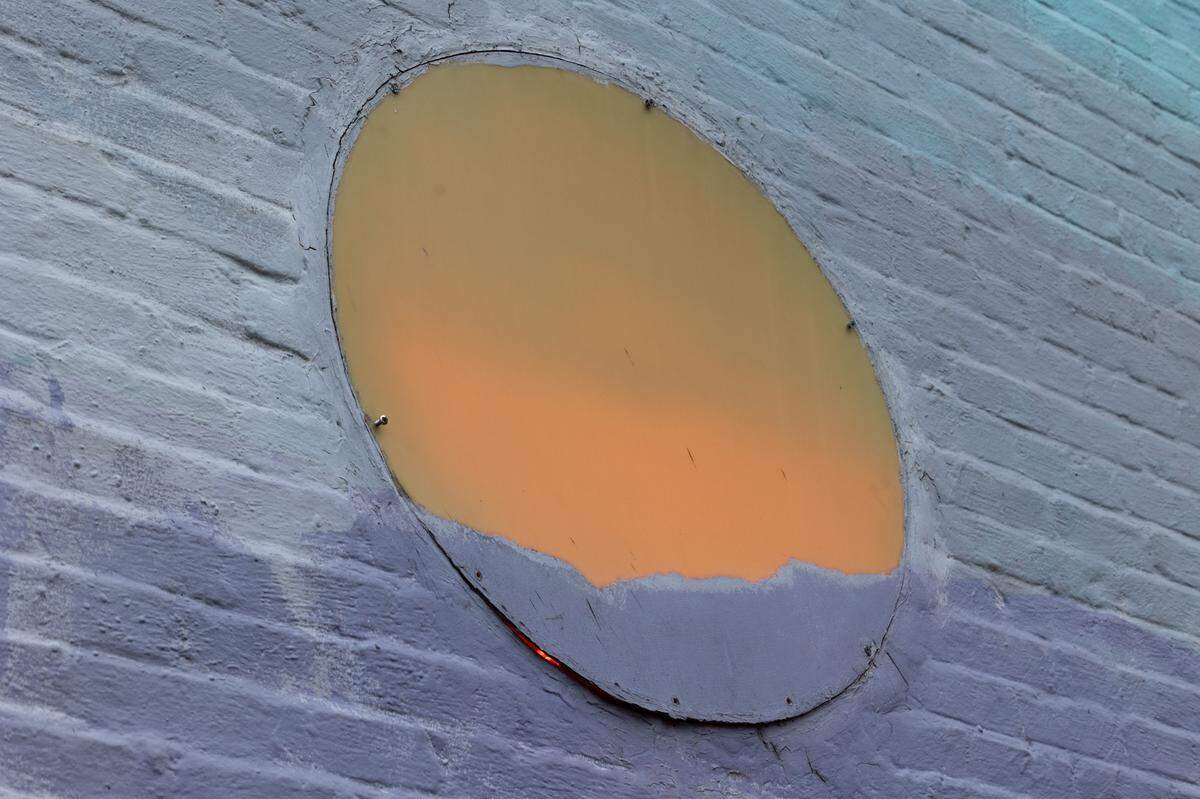 Blue Sky’s mural “Tunnelvision” off Taylor Street in downtown Columbia, South Carolina, on Tuesday, April 1, 2025. The painting was paired with the “Busted Plug” sculpture.