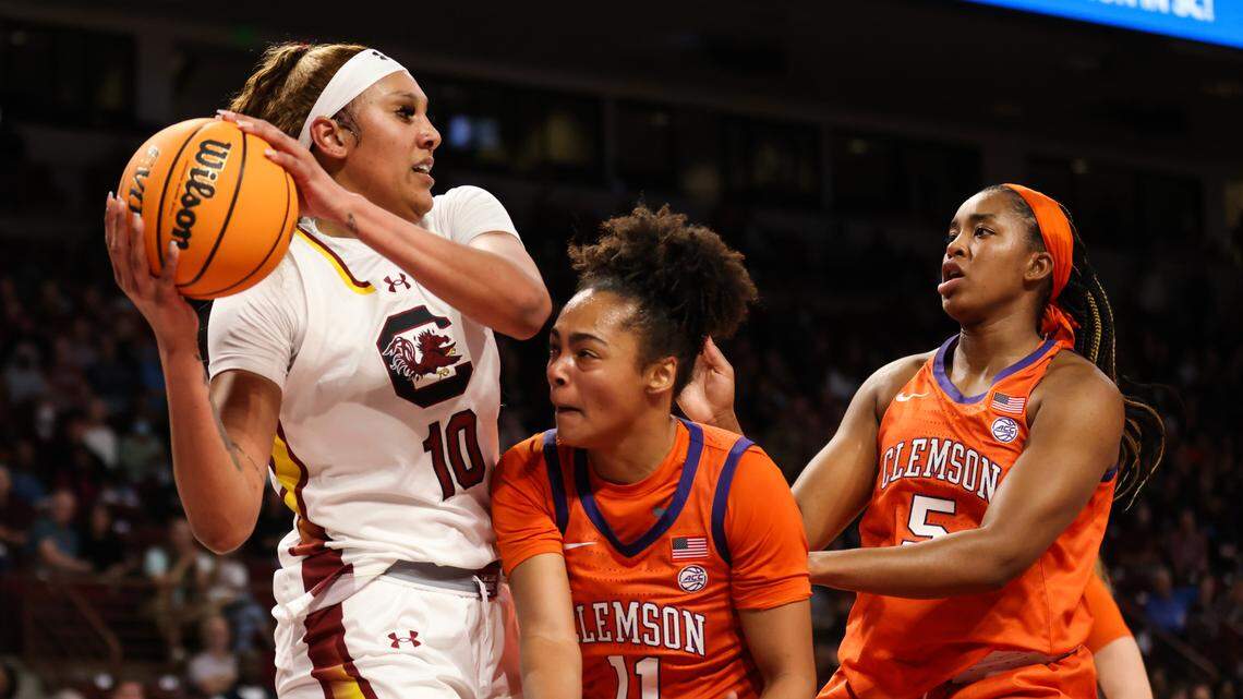South Carolina center Kamilla Cardoso (10) pulls down a rebound in front of Clemson forward Amari Robinson (5) and Maddi Cluse (11) during the first half of the Gamecocks’ game against the Tigers at Colonial Life Arena in Columbia on Thursday, November 16, 2023.