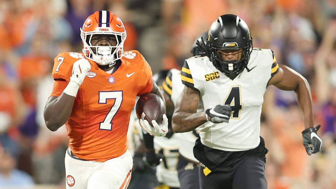 Clemson running back Phil Mafah (7) leaves Appalachian State safety Myles Farmer (4) behind as he runs for a touchdown during first-half action in Clemson, S.C. on Saturday, Sept. 7, 2024.