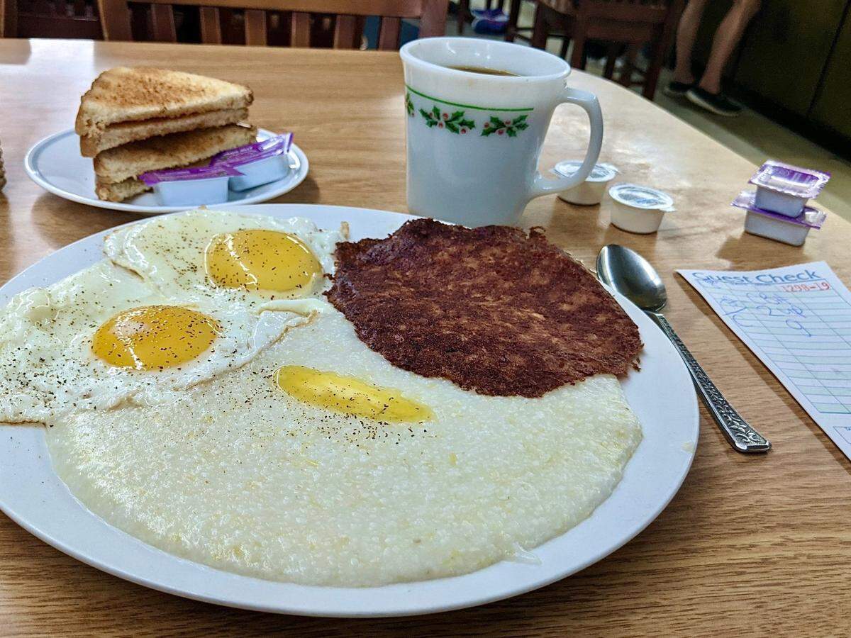 Meat ‘n’ threes are known for their hardy, inexpensive breakfasts that feature Southern favorites like fatback, liver puddin’ and onion sausage.