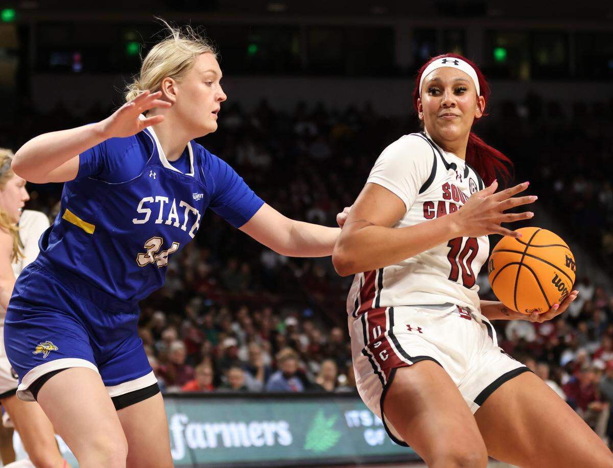 South Carolina center Kamilla Cardoso (10) pushes toward the basket as South Dakota State forward Natalie Nielsen (34) during the first half of the Gamecocks’ game at Colonial Life Arena in Columbia on Monday, November 20, 2023.