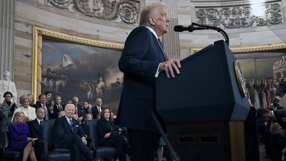 US President Donald Trump speaks as former US President Joe Biden and former US Vice President Kamala Harris look on during inauguration ceremonies in the Rotunda of the US Capitol on Jan. 20, 2025, in Washington, DC. Donald Trump takes office for his second term as the 47th president of the United States. (Chip Somodevilla/Pool/AFP/Getty Images/TNS)