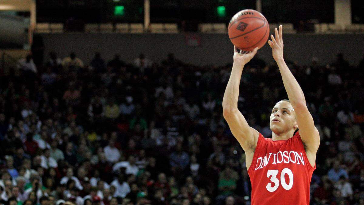 Steph Curry, then a junior at Davidson College, shoots during an NIT basketball tournament game in March 2009 in Columbia, South Carolina. (AP Photo/Brett Flashnick)