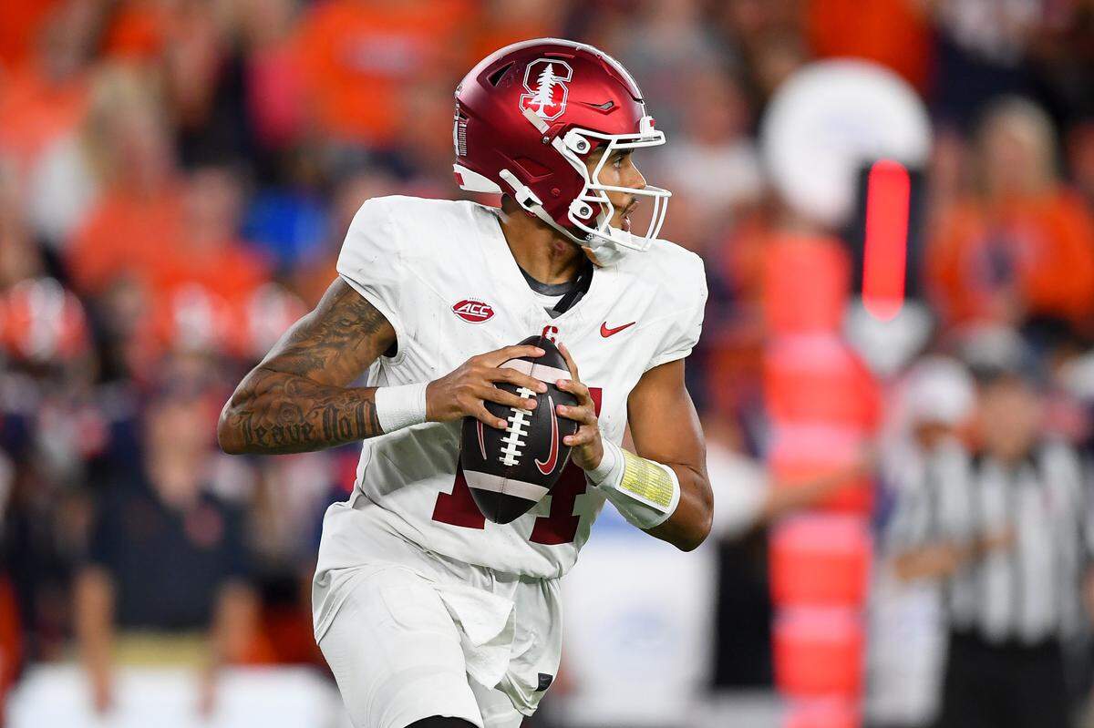 Sep 20, 2024; Syracuse, New York, USA; Stanford Cardinal quarterback Ashton Daniels (14) looks to pass against the Syracuse Orange during the second half at the JMA Wireless Dome. Mandatory Credit: Rich Barnes-Imagn Images