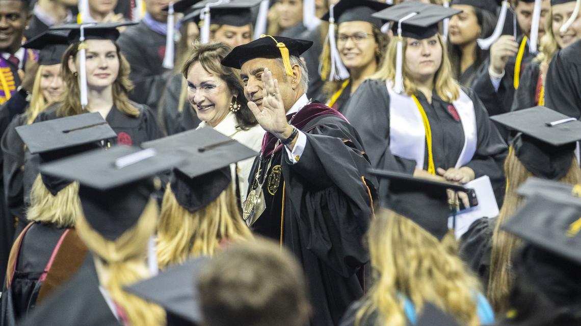 President Harris Pastides and first lady Patricia Moore-Pastides wave to students as they enter for USC’s commencement ceremony at Colonial Life Arena Saturday May 11, 2019, in Columbia, SC.