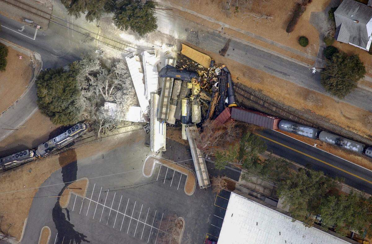 (01/05/05) Gerry Melendez/The State---Wreckage from two trains involved in a crash are shown near downtown Graniteville, S.C., in January 2005. A Norfolk Southern freight train carrying chlorine gas struck a parked train, releasing the gas and killing some residents. Others were treated for exposure to fumes.
