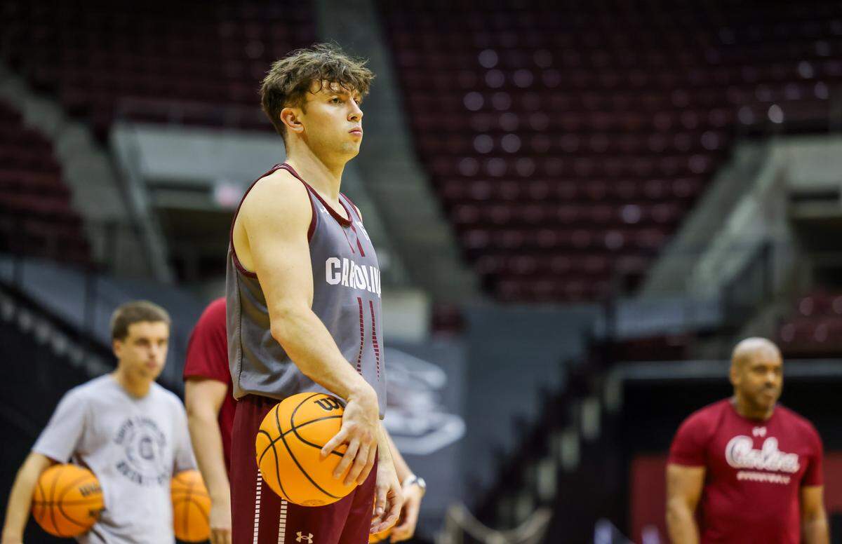 South Carolina guard Eli Ellis (15) listens during the Gamecocks’ practice on Oct. 2.
