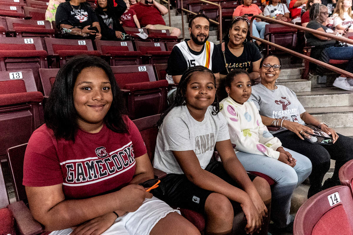Teya Brown, 11, Makayla Cargill, 11, Trinity Brown, 11, Lisa Boyd and Destiny and Thomas Brown of Elgin bought their tickets on the first day they were for sale so they could see A’ja Wilson and the Las Vegas Aces play in the Colonial Life Arena.