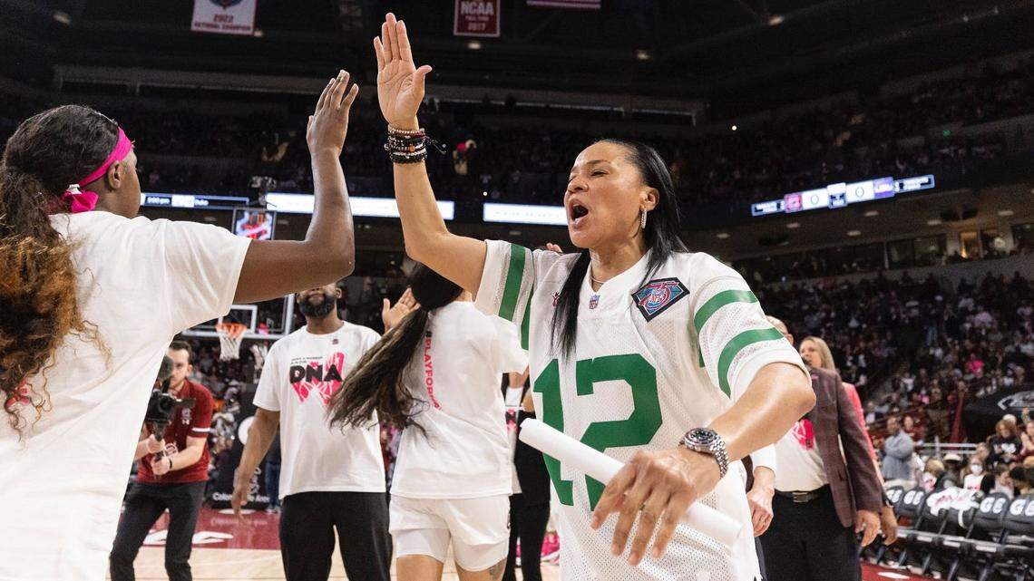 Dawn Staley wears a Randall Cunningham Philadelphia Eagles jersey during Sunday’s game against LSU.