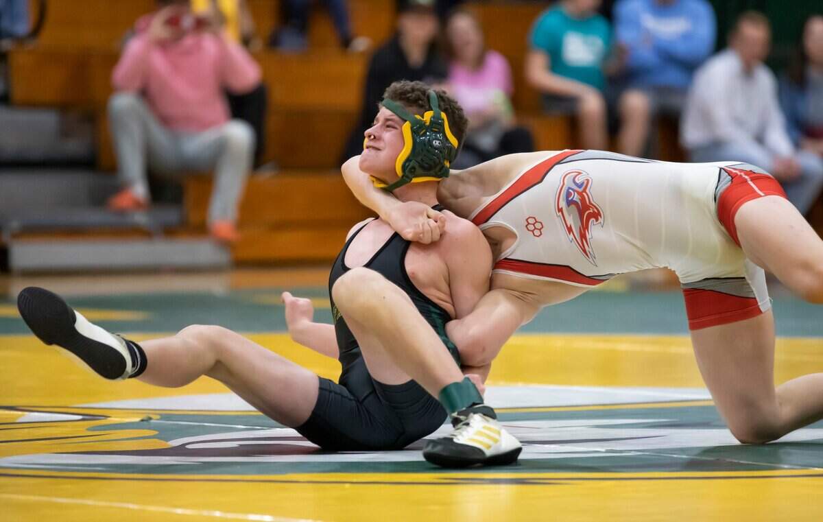 Jordan Desch of Ben Lippen gets wrapped up by Luke Martin of Hammond School during the SCISA 2022 Duals State Wrestling Tournament at Ben Lippen on Saturday, February 5, 2022.