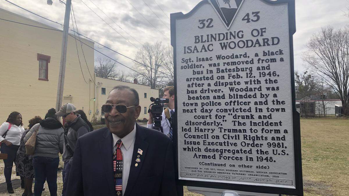 Robert Young, nephew of Isaac Woodard, stands by the just-unveiled official historical marker of Isaac Woodard’s blinding in Batesburg-Leesville in February 2019.