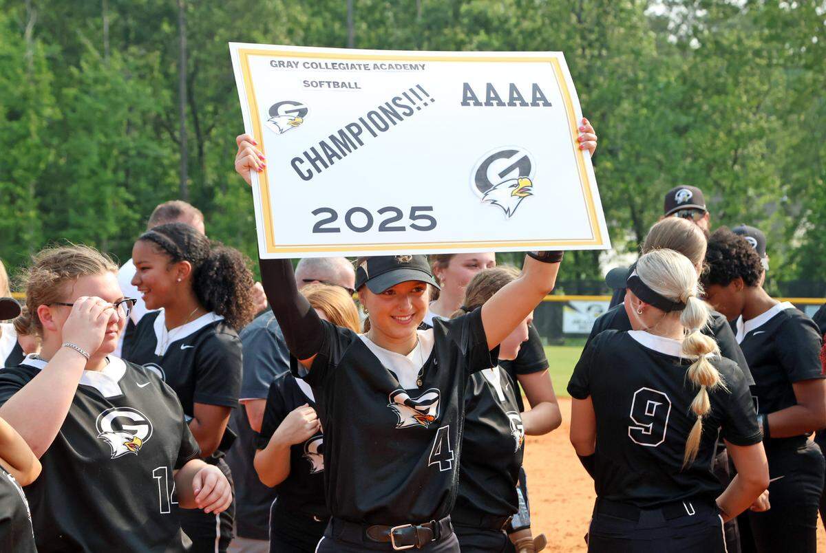 Gracie Porter (4) and Gray Collegiate celebrate the 2025 Class 4A softball state championship win on Saturday, May 31. The War Eagles defeated York 5-2.