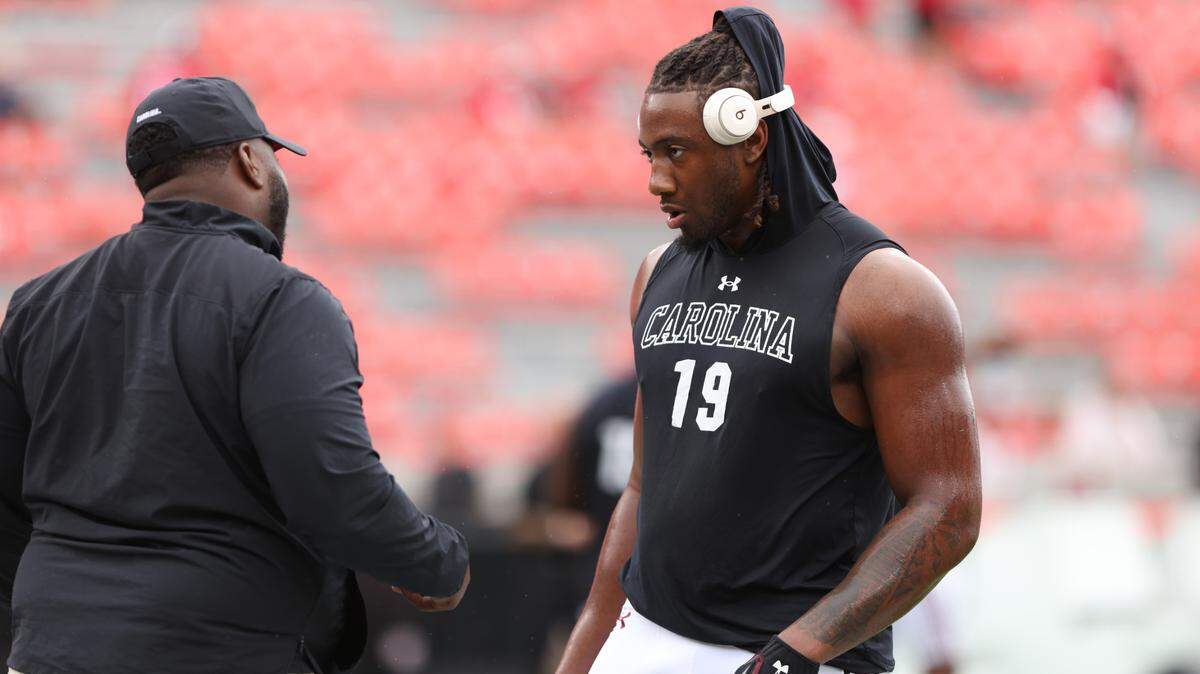 South Carolina defensive end Drew Tuazama (19) warms up before the Gamecocks’ game at Sanford Stadium in Athens on Saturday, September 16, 2023.