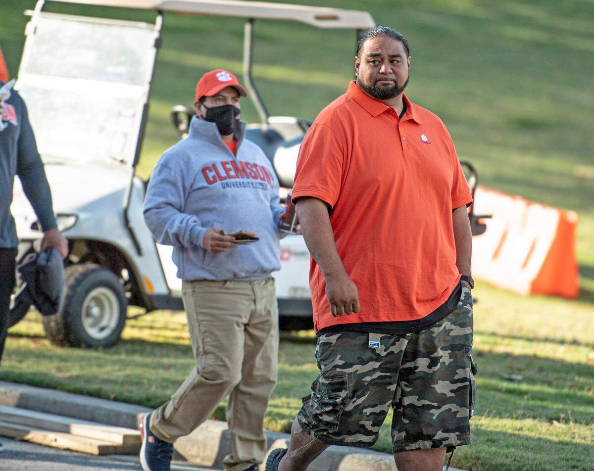 Dave Uiagalelei, father of quarterback D.J. Uiagalelei walks up to Tiger Walk before the game against Boston College.