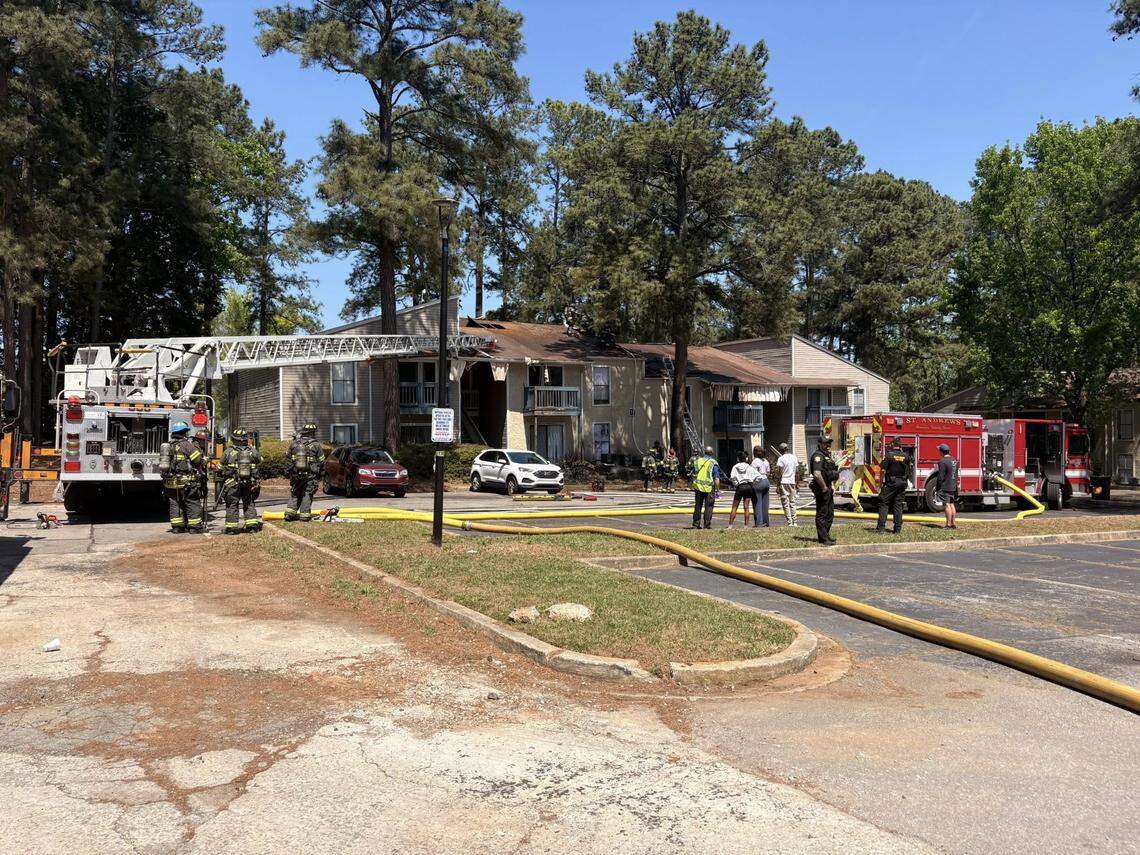Firefighters respond to a burning home.