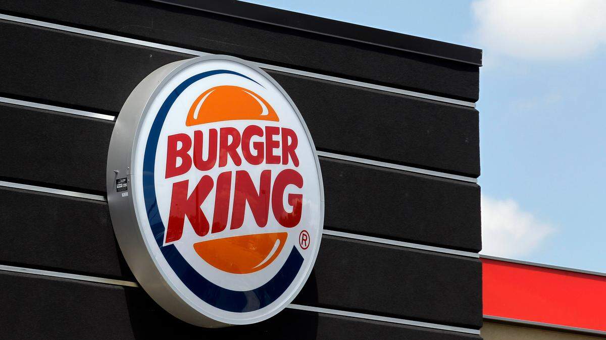 A Burger King restaurant sign is shown in Indianapolis, Wednesday, June 20, 2012. The world’s No. 2 hamburger chain is switching up its menu with the return of a limited-time sandwich. (AP Photo/Michael Conroy)