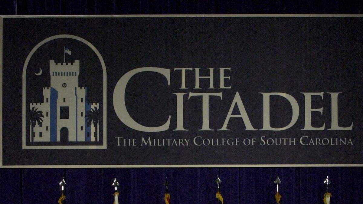 This file photo shows a banner with The Citadel’s logo.