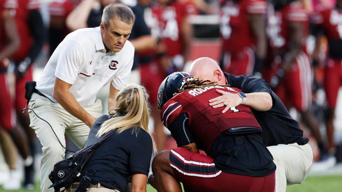 South Carolina Gamecocks defensive back R.J. Roderick (1) speaks with athletic trainers and head coach Shane Beamer during the game against Georgia State at Williams-Brice Stadium in Columbia, SC on Saturday, Sept. 3, 202