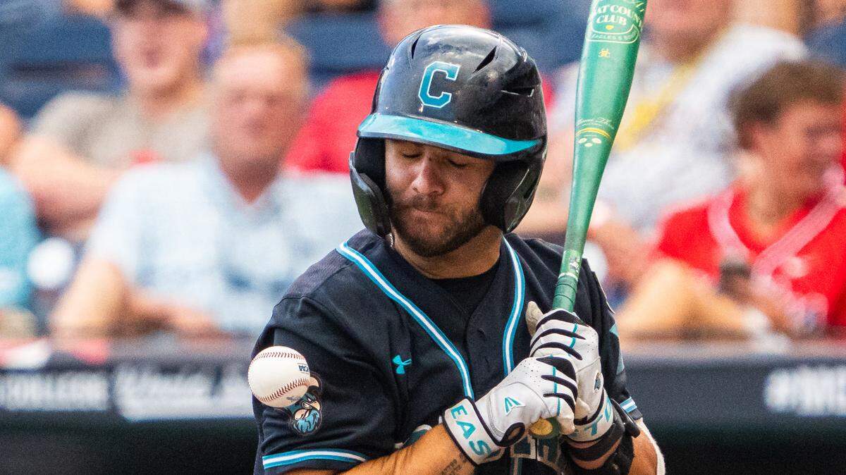 Coastal Carolina Chanticleers first baseman Colby Thorndyke (16) is hit by a pitch during the fifth inning against the Oregon State Beavers on June 15 at Charles Schwab Field.