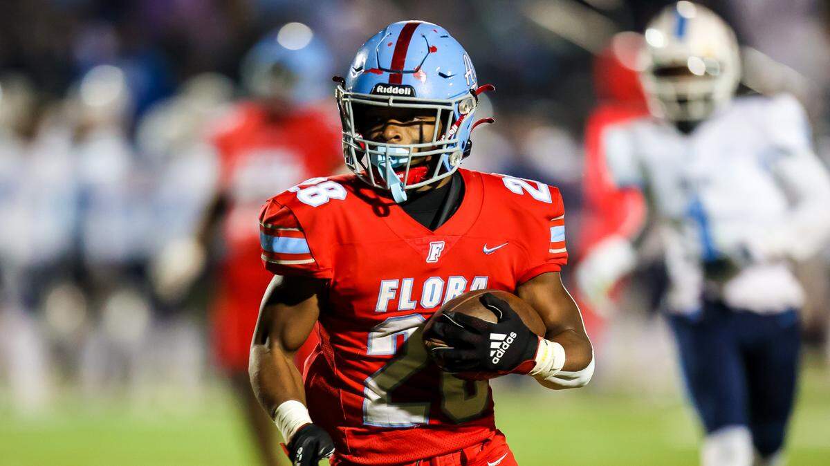 AC Flora Falcons running back Markel Townsend (28) rushes against the South Florence Bruins in the 4A Lower State Championship Game at Memorial Stadium, Nov. 25, 2022.