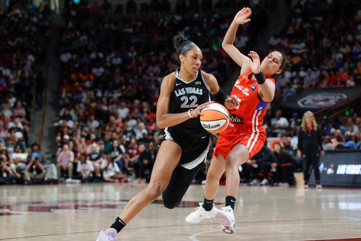 Las Vegas Aces’ A’ja Wilson drives past Puerto Rican National’s Isalys Quinones during the exhibition game at the Colonial Life Arena on Saturday May 11, 2024.