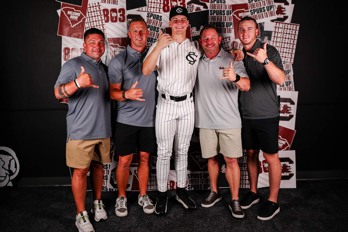 Brogan Witcher alongside members of the new South Carolina baseball coaching staff during his visit.
