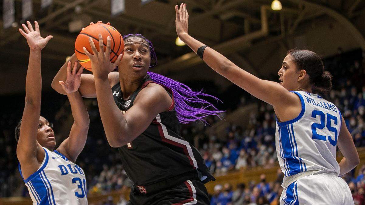 Duke’s Shayeann Day-Wilson (30) and Jade Williams (25) defend South Carolina’s Aliyah Boston (4) in the second half on Wednesday, December 15, 2021 at Cameron Indoor Stadium in Durham, N.C. Boston lead all scores with 19 points and the Gamecocks to a 55-46 victory.