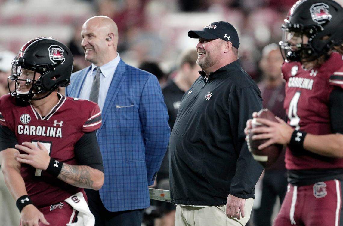 South Carolina’s Freddie Kitchens talks with SEC Network’s Cole Cubelic during warmups ahead of the Gamecocks’ Oct. 22, 2022 game against Texas A&M at Williams-Brice Stadium.