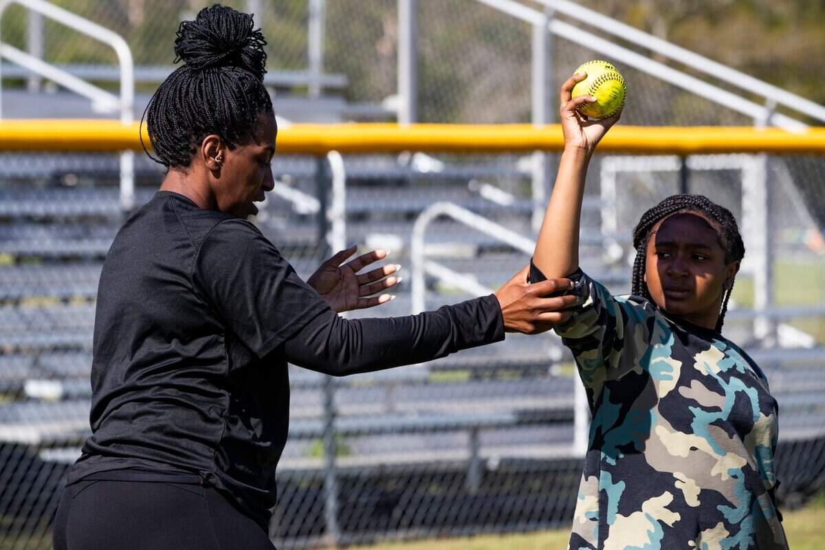 Lower Richland High School softball coach Sheree Jackson leads practice on Thursday, April 7, 2022.