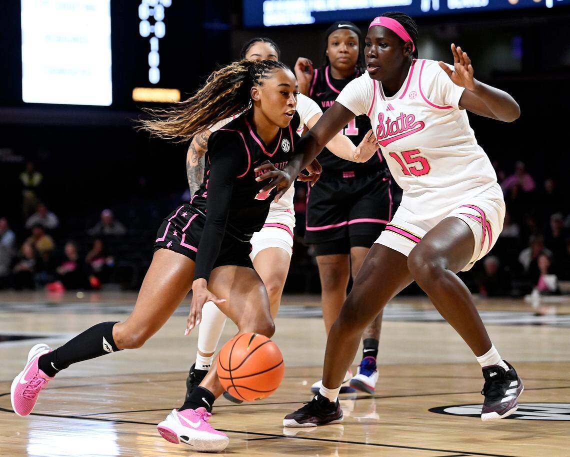 Vanderbilt guard Mikayla Blakes (1) drives to the basket past Mississippi State center Madina Okot (15) during an NCAA college basketball game Thursday, Feb. 13, 2025, in Nashville, Tenn.