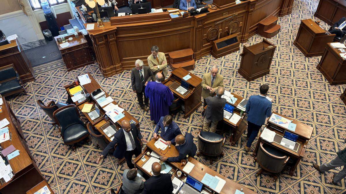 South Carolina senators huddle during a brief recess ahead of redistricting debate on Friday, May 22, 2026.