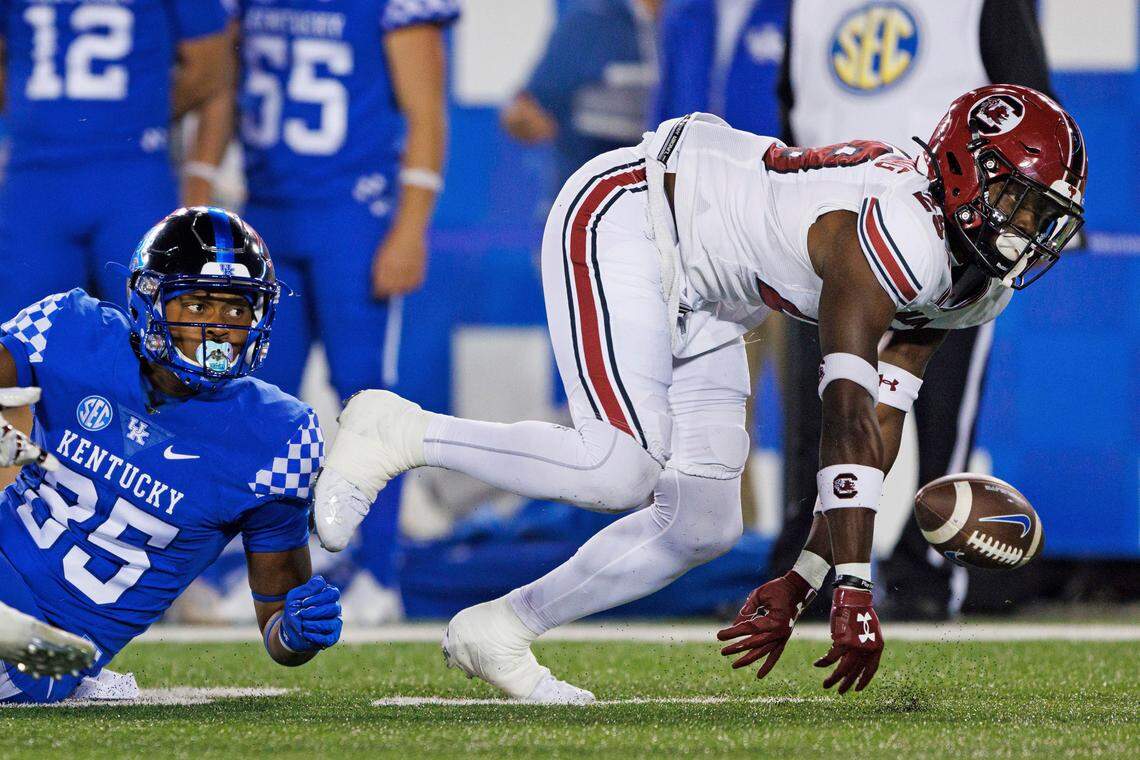 South Carolina defensive back David Spaulding (29) forces a fumble by Kentucky running back Sean O’Horo (35) on the first play from scrimmage of an NCAA college football game in Lexington, Ky., Saturday, Oct. 8, 2022.