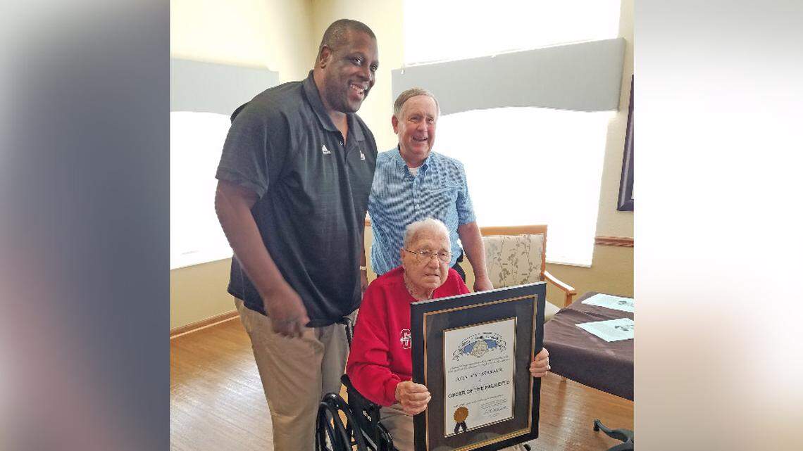 Cy Szakacsi with former player Xavier McDaniel and statistician Jack Haynes.