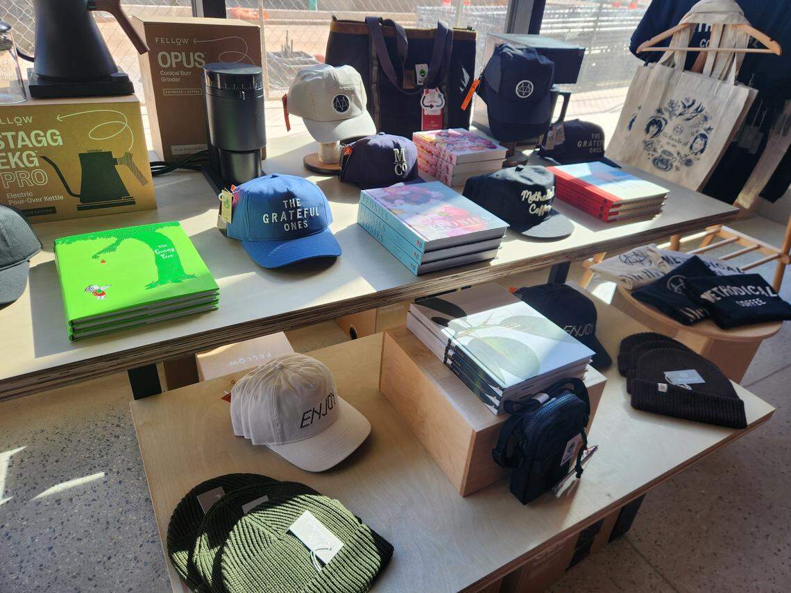 Hats and other merchandise are displayed at Methodical Coffee’s new shop at the BullStreet District in Columbia.