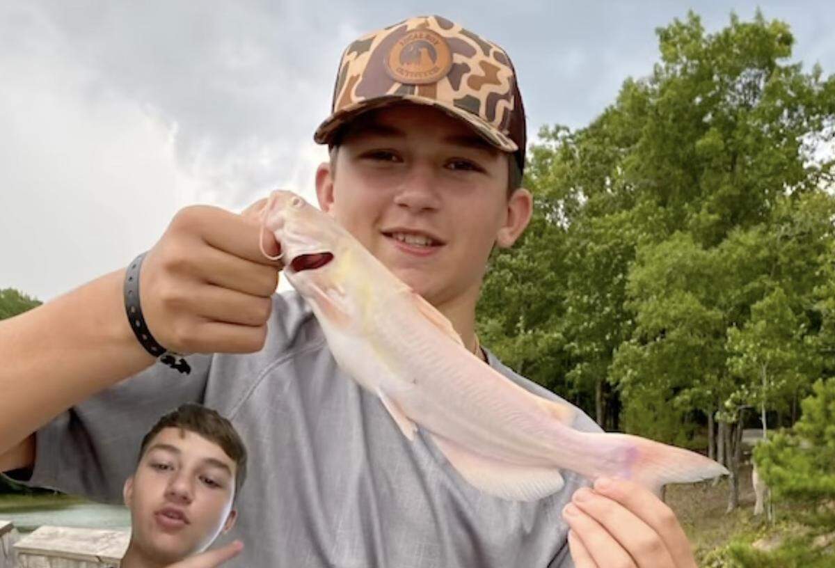 Logan Overholt, 13, of Abbeville, shows off the rare fish he caught.