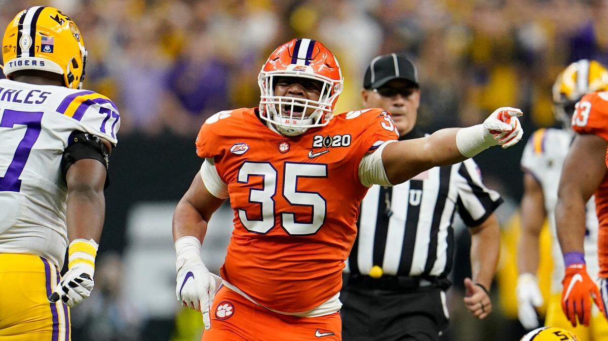 LSU quarterback Joe Burrow is sacked by Clemson defensive end Justin Foster (35) during national championship game Monday, Jan. 13, 2020, in New Orleans.(AP Photo/David J. Phillip)